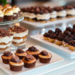 Tiramisu, and chocolate cupcakes topped with chocolate frosting